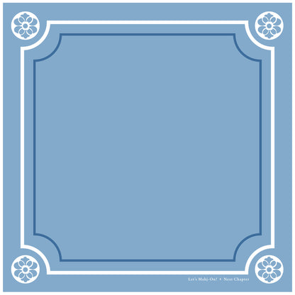 A square blue graphic with a decorative border, featuring a large blank central panel and small text at the bottom right that reads 'Let's Mahj-On x Next Chapter